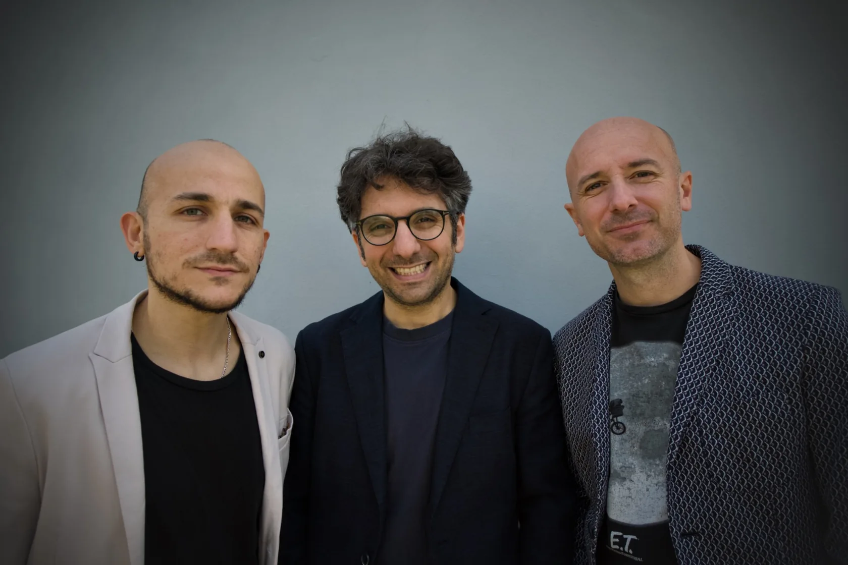 Ritratto di gruppo dei tre musicisti